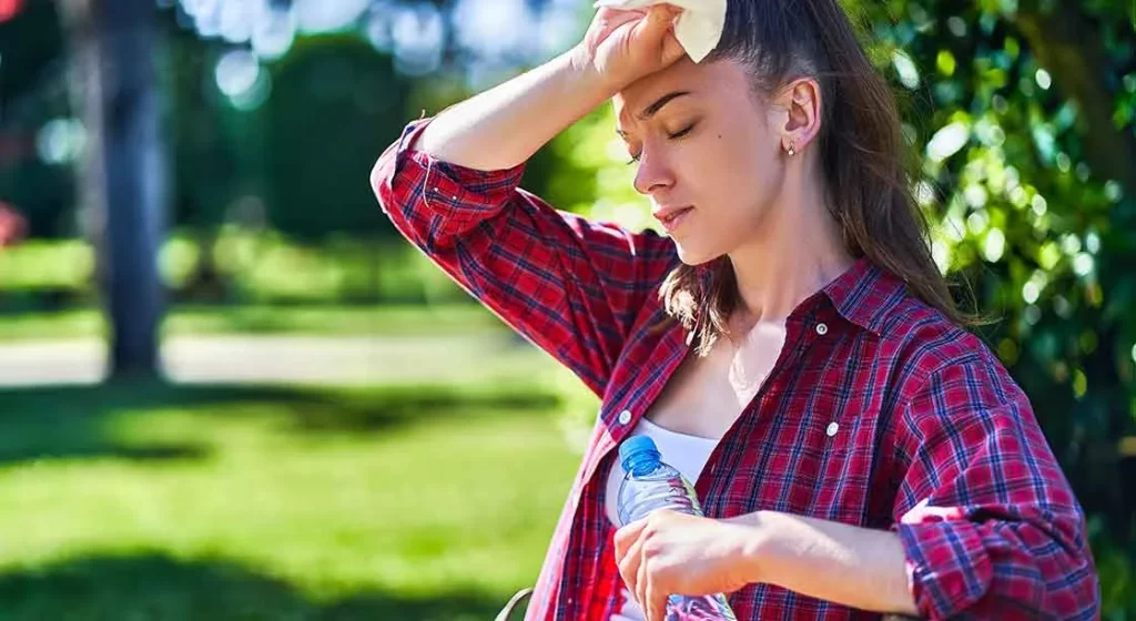 mujer con calor